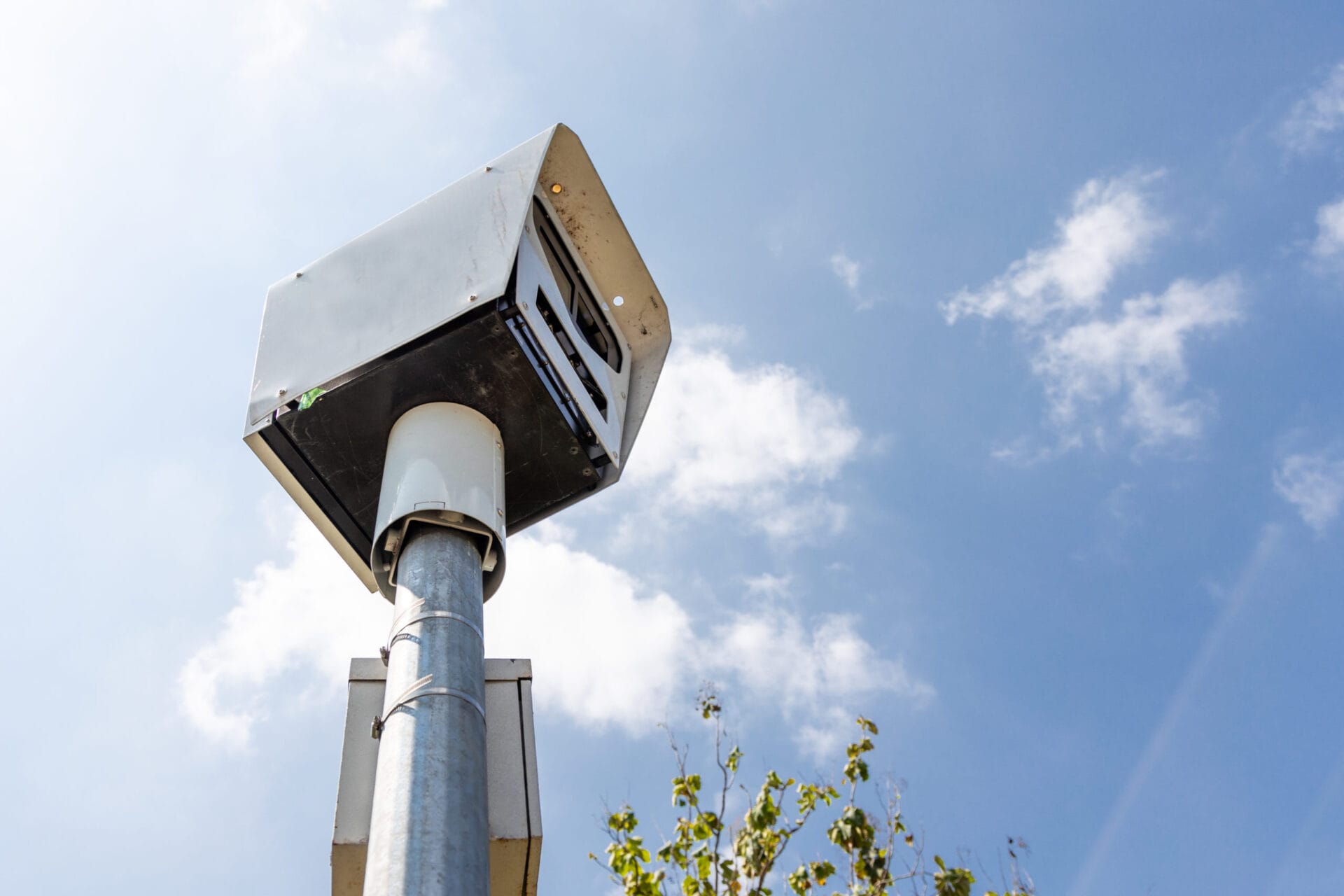 Close-up on speed trap surveillance camera along highway to control speeding to reduce speeding related ccidents.