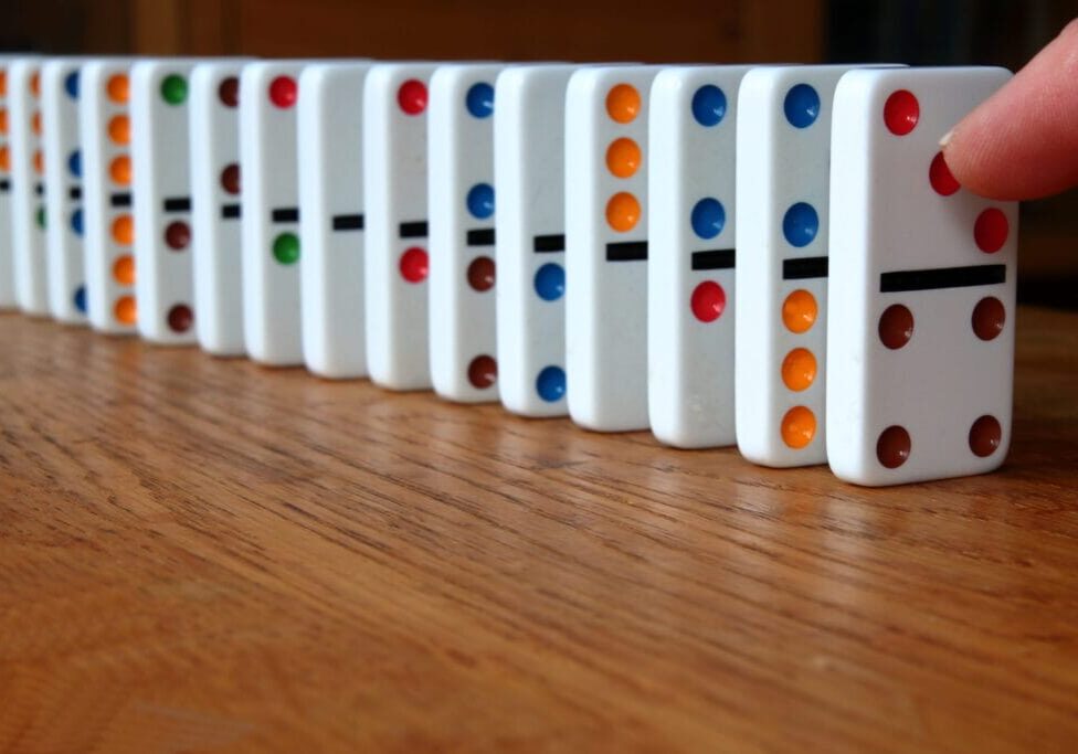 Line of dominoes ready to be pushed